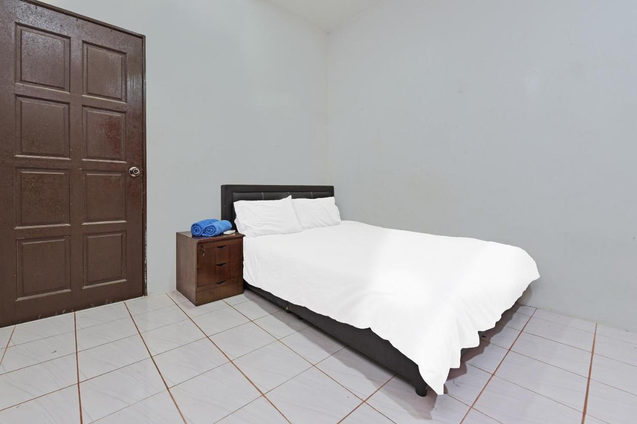 Oyo 90596 Casaria Inn Paka 外观 照片