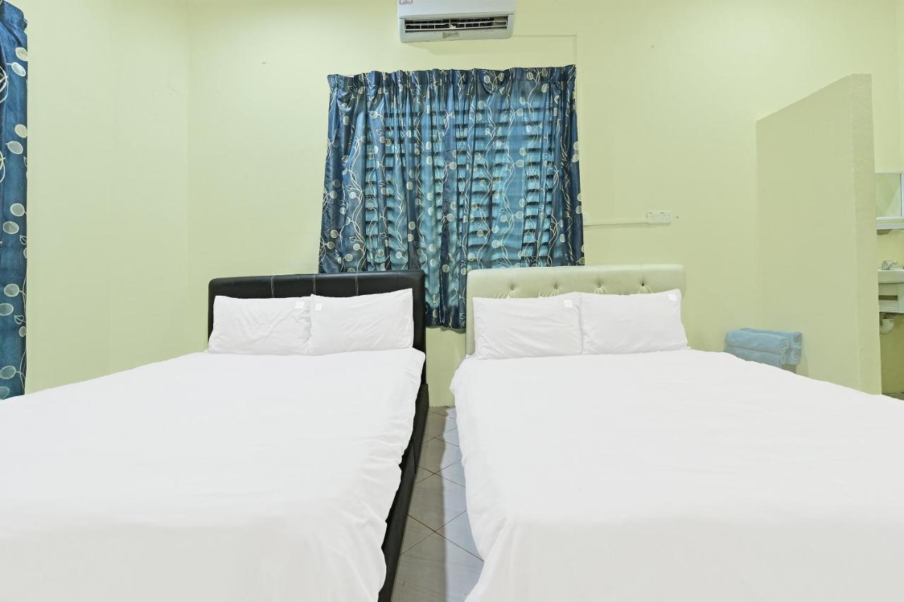 Oyo 90596 Casaria Inn Paka 外观 照片