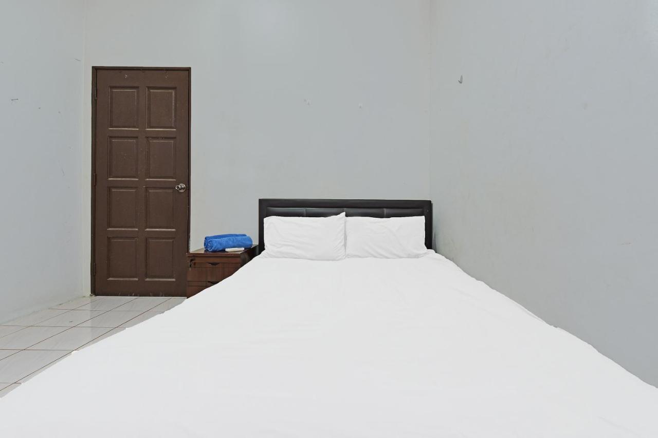 Oyo 90596 Casaria Inn Paka 外观 照片